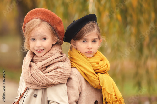 Cute little girls in autumn...