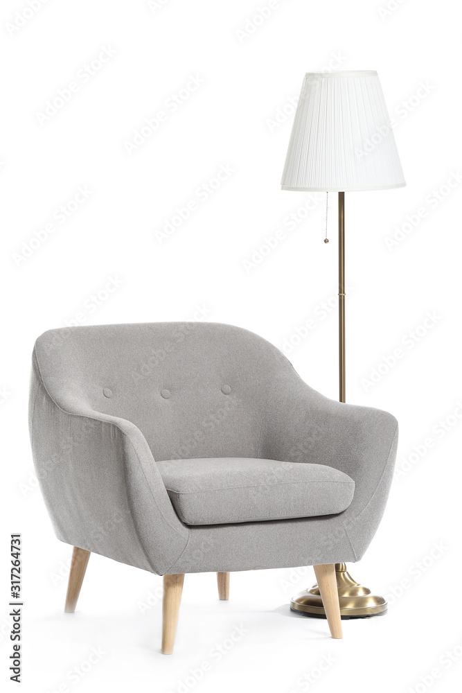 Modern armchair and lamp on white background Modern armchair and lamp on white background