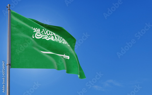 Saudi Arabia flag waving in the wind against deep blue sky. National theme, international concept. Copy space for text.