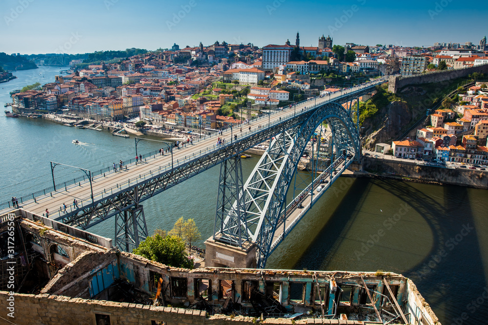 Obraz premium View of Porto city and the Dom Luis I Bridge a metal arch bridge over the Douro River