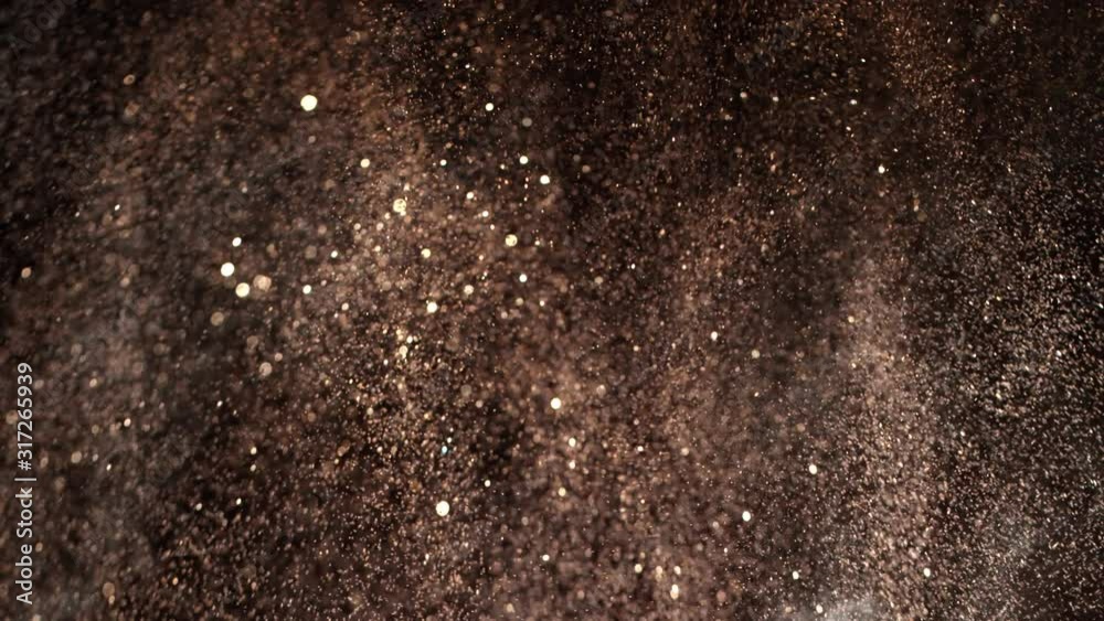 Golden Glitter Background in Super Slow Motion at 1000fps. Golden Glitter Background in Super Slow Motion at 1000fps.