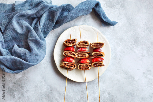 Pinwheel Nutella pancakes and strawberries
