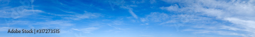 Blue sky background with clouds photo