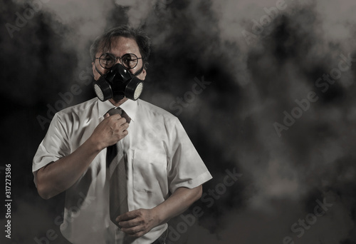 Male employees wear dust and smoke masks To prevent air pollution