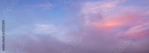 Evening sky background with clouds © wildman