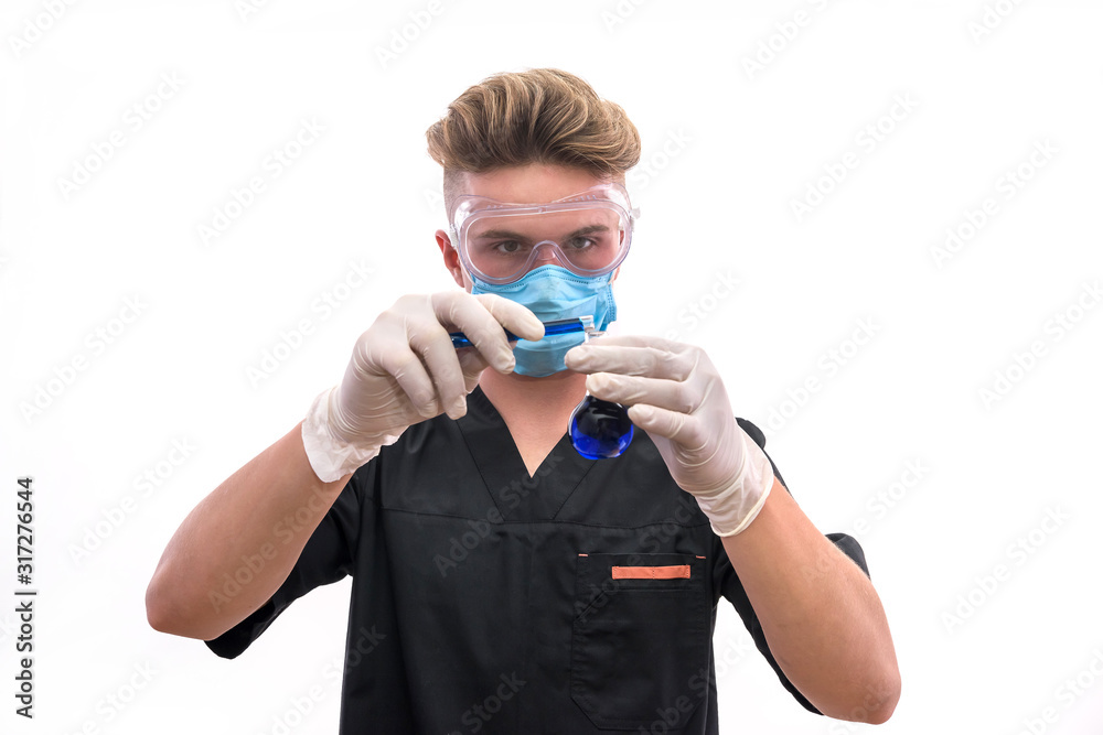 Chemist with flask in laboratory making scientific experiment Chemist with flask in laboratory making scientific experiment