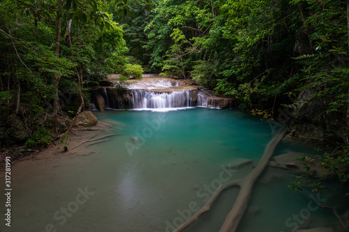 Beautiful natural scenic of Erawan waterfall with emerald green pond in Kanchanaburi, Thailand