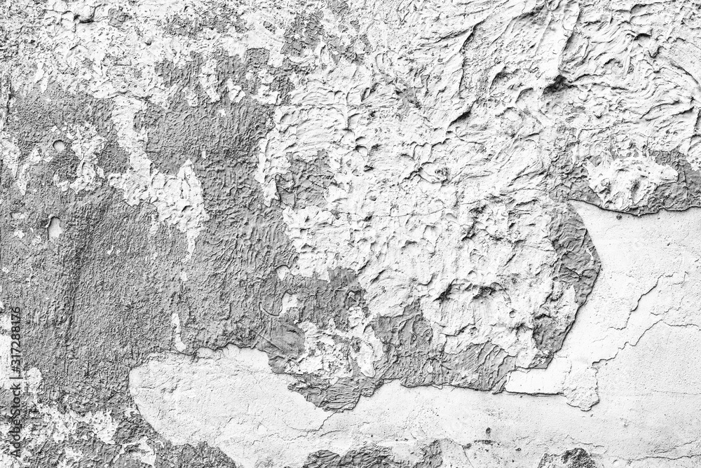 Fototapeta premium Texture of a concrete wall with cracks and scratches which can be used as a background