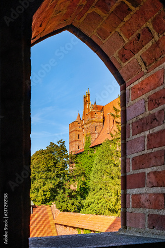 Monumental gothic defence architecture of the High Castle part of the medieval Teutonic Order Castle in Malbork, Poland photo