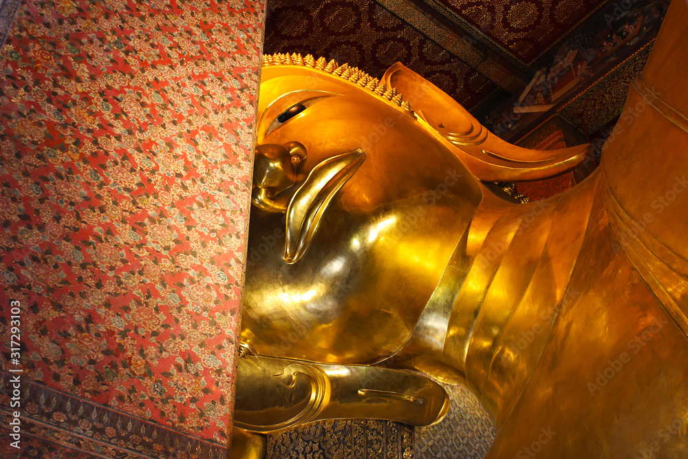 Reclining Golden Buddha Statue in Thai temple