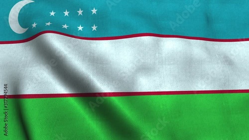 Uzbekistan flag waving in the wind. National flag of Uzbekistan photo