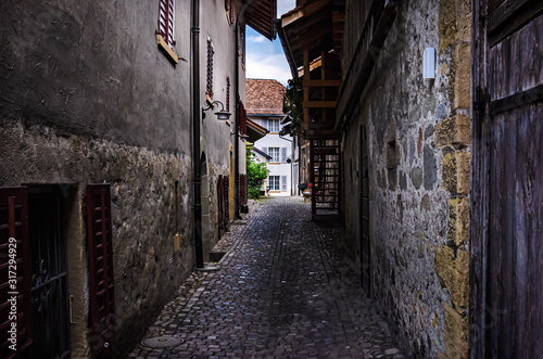 Narrow cobbled street in the old town of Murten  Morat   Switzerland