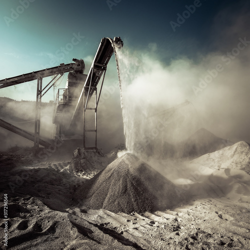 Industrial background with working gravel crusher © PerfectLazybones