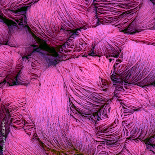 Big skeins of thread. Set of colorful wool yarn balls. Closeup photo.