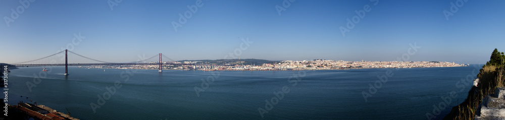 Lisbon city panorama as seen from Almada, the south bank of Tagus river