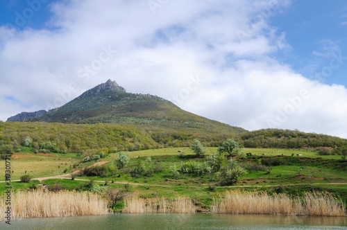 Lake and village among the mountains