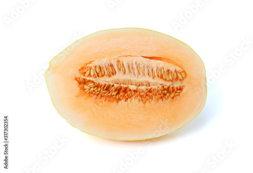 Close up water drops half of yellow melon isolated on white background with clipping path