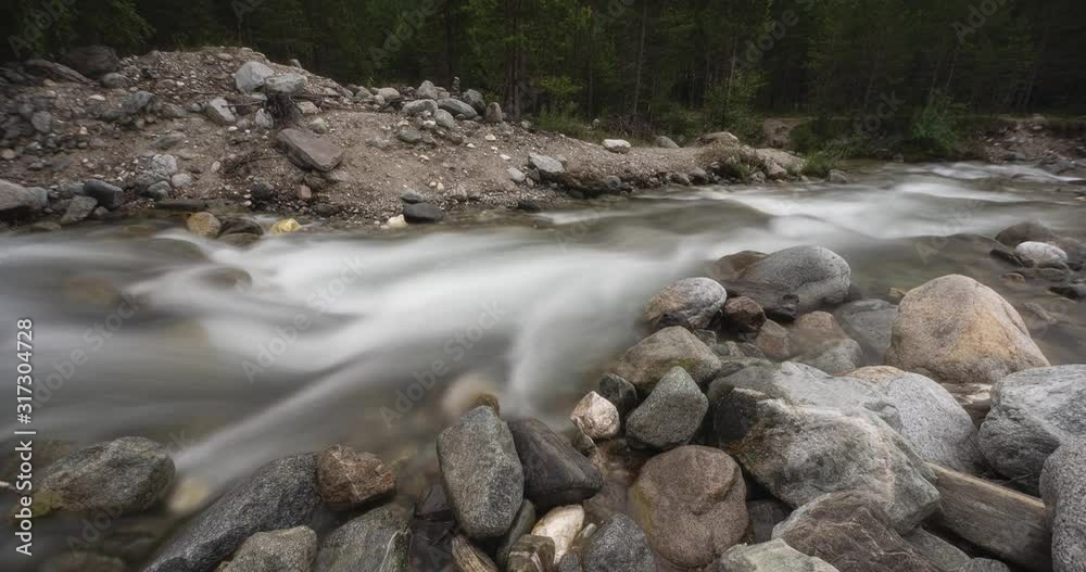Arshan Mountain River Water in a mountain river like foam, long exposure. Timelapse. Arshan Mountain River Water in a mountain river like foam, long exposure. Timelapse.
