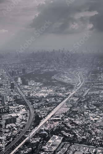 Air pollution over Bangkok, Thailand. Urban infrastructure of a sprawling city, large metropolis. Black and white color toned vintage effect.