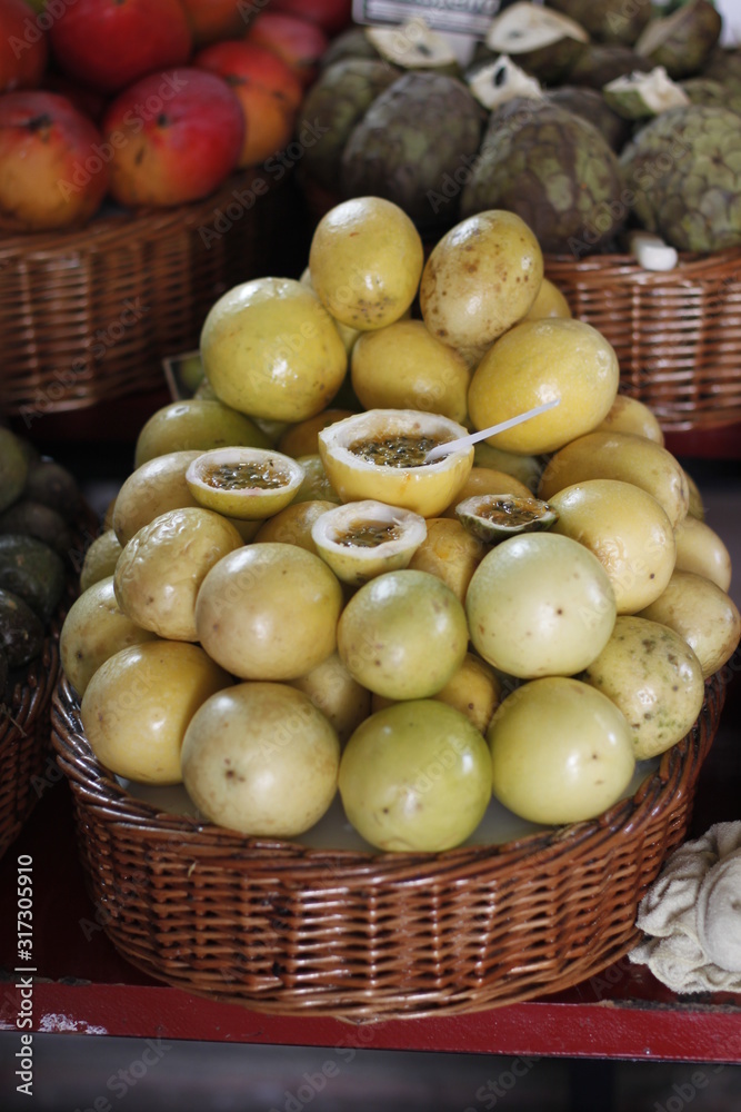basket of passion fruits at the market in Funchal 