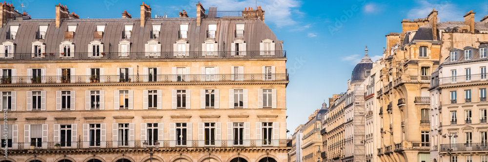 Fototapeta premium Paris, typical facade and windows, beautiful building rue de Rivoli