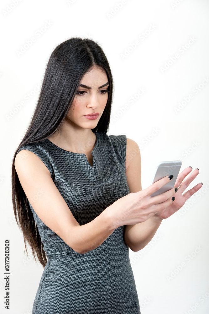 Naklejka premium Businesswoman using smart phone