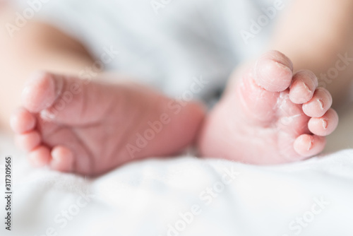 Fotografia dei piedi newborn