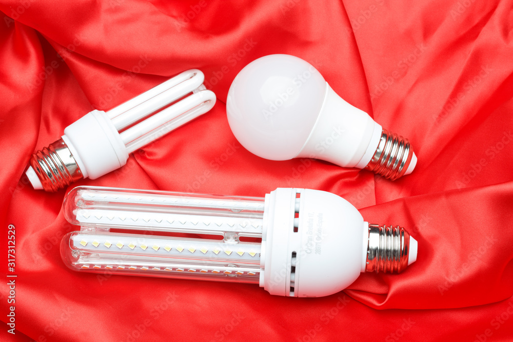 Energy saving light bulb and white light; home and work lighting. Energy saving light bulb and white light; home and work lighting.