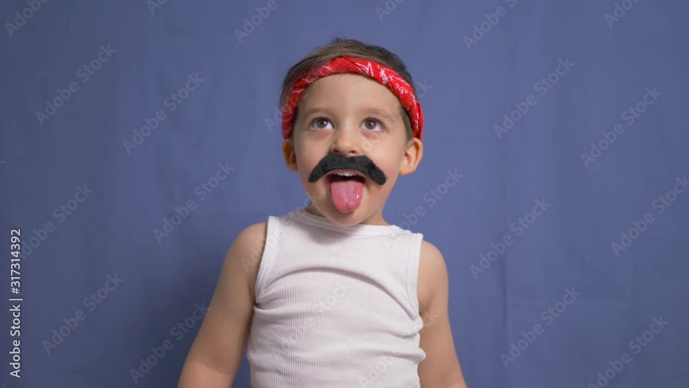 funny Mexican boy with a big black mustache and a white t shirt funny Mexican boy with a big black mustache and a white t shirt