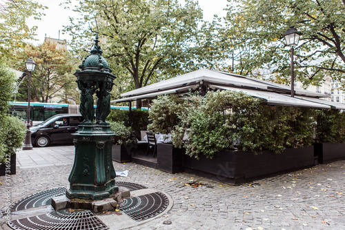 Fontaine Wallace and the cafeteria on the streets of Paris. photo