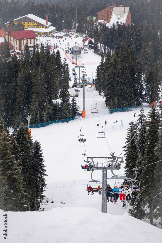 Ilgaz ski center in national park in winter time with lift and skiers Ilgaz ski center in national park in winter time with lift and skiers