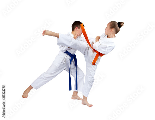 Ura mavashi geri and gyaku tsuki are beating sportsmens in karategi