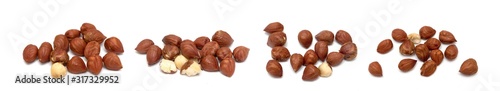 Hazelnut seeds on a white background.