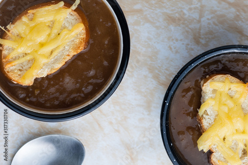 French onion soup with cheese topped croutes photo