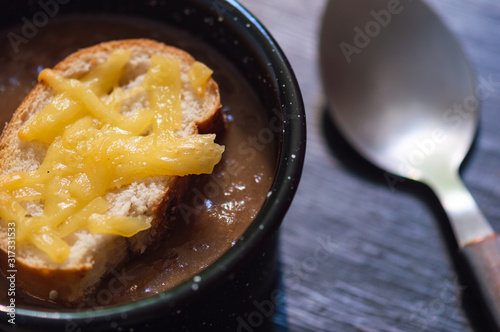 French onion soup with cheese topped croutes photo