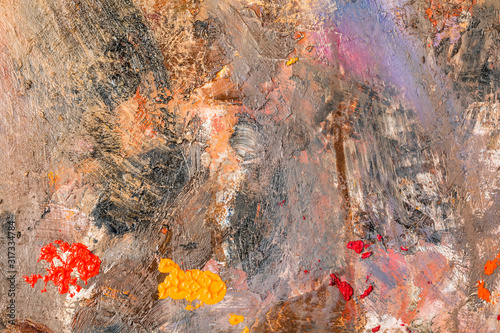 Background image of bright oil-paint palette closeup.