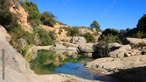 Soft river in beautiful nature with clear sky
