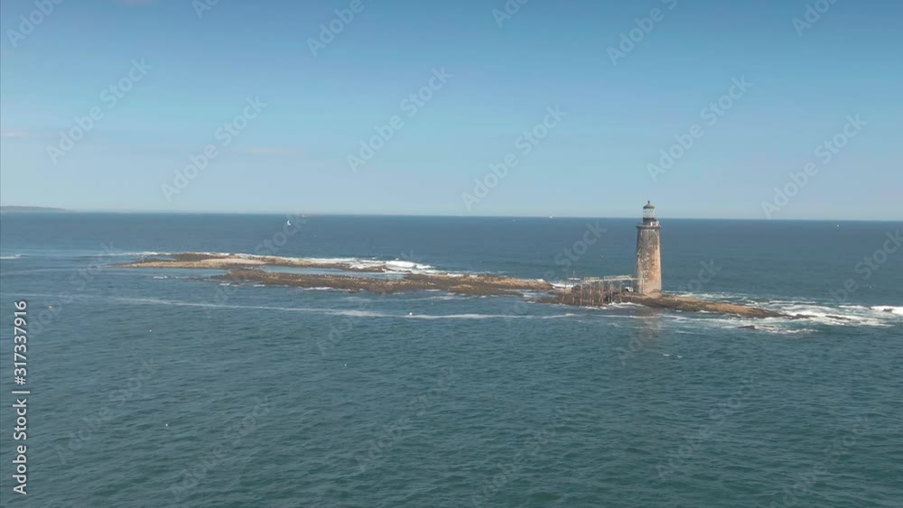 Aerial: Ram Island Ledge Light Station off the coast of Portland, Maine, USA Aerial: Ram Island Ledge Light Station off the coast of Portland, Maine, USA