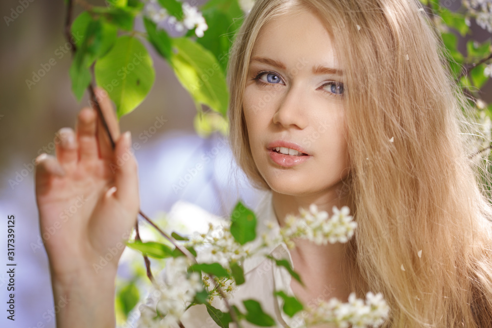 Beautiful girl with flowers in spring. Spring flowering. Pollen allergy concept. Beautiful girl with flowers in spring. Spring flowering. Pollen allergy concept.