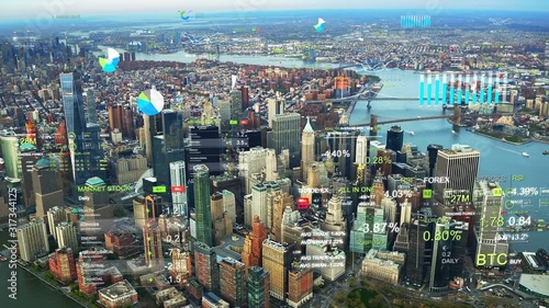 Aerial view of New York with financial charts and data. Futuristic city skyline. Big data, Artificial intelligence, Internet of things. Stock exchange figures. Holographic information.