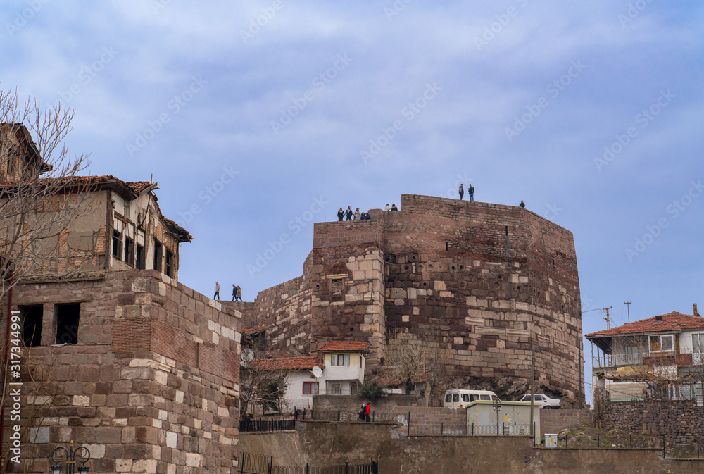 Ankara/Turkey - December 29 2019: People enjoying on the wall of Ankara Castle Ankara/Turkey - December 29 2019: People enjoying on the wall of Ankara Castle