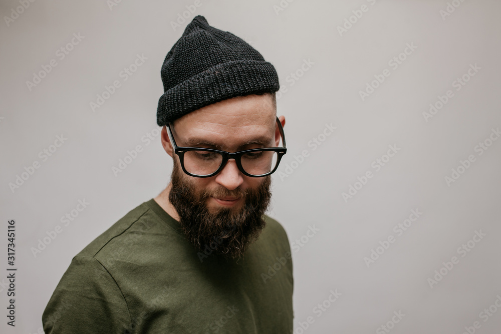 Handsome hipster guy with beard wearing blank casual beanie. Mockup for  print Stock Photo | Adobe Stock