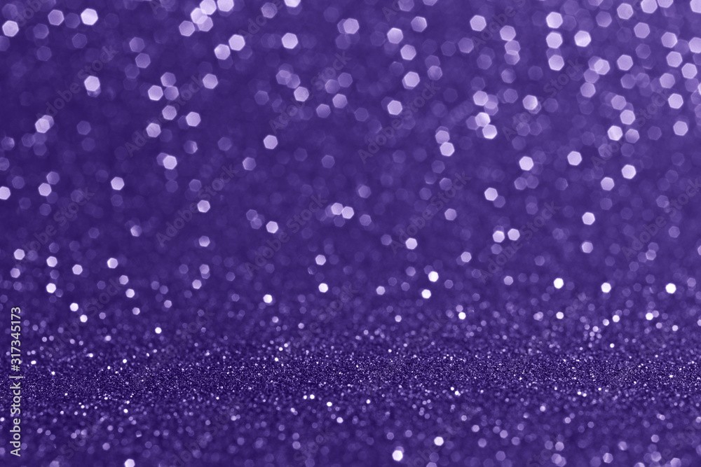 Abstract blurred background.Sparkling bokeh.Glitter texture.Outstanding ultra violet color.