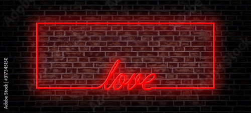 red neon frame and love word on the brick wall