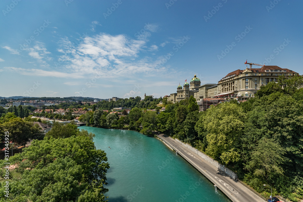 Bern, Switzerland - July 26, 2019: Panoramic view from one of the bridges. . Aare river at sunny summer day