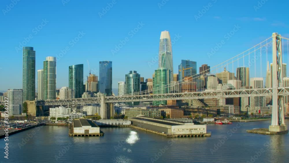 Aerial view of the San Francisco Oakland Bay Bridge. California, US. With traffic. Financial District in the background. Shot on Red weapon 8K. Aerial view of the San Francisco Oakland Bay Bridge. California, US. With traffic. Financial District in the background. Shot on Red weapon 8K.