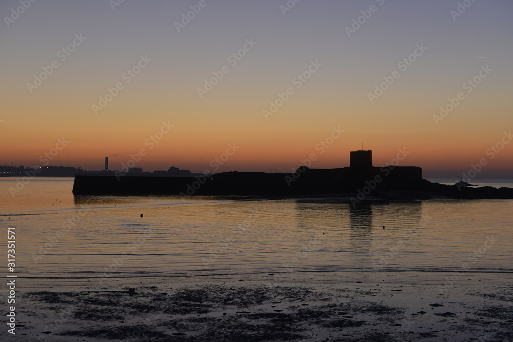 St Aubin's Fort, Jersey, U.K. Winter coastal sunrise.