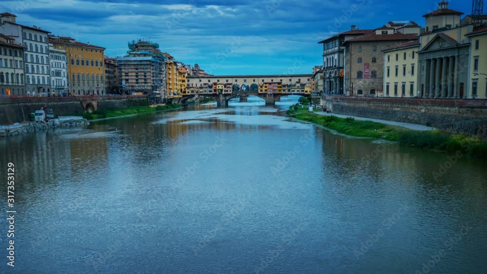 Hyperlapsed view of the medieval Ponte Vecchio over the Arno river. From night to day. Florence, Italy. Hyperlapsed view of the medieval Ponte Vecchio over the Arno river. From night to day. Florence, Italy.