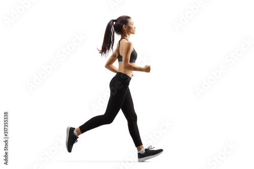 Fototapeta Naklejka Na Ścianę i Meble -  Young woman jogging