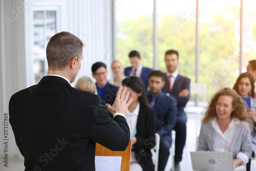 Speaker Giving a Talk at Business Meeting. Audience in the conference hall. Business and Entrepreneurship